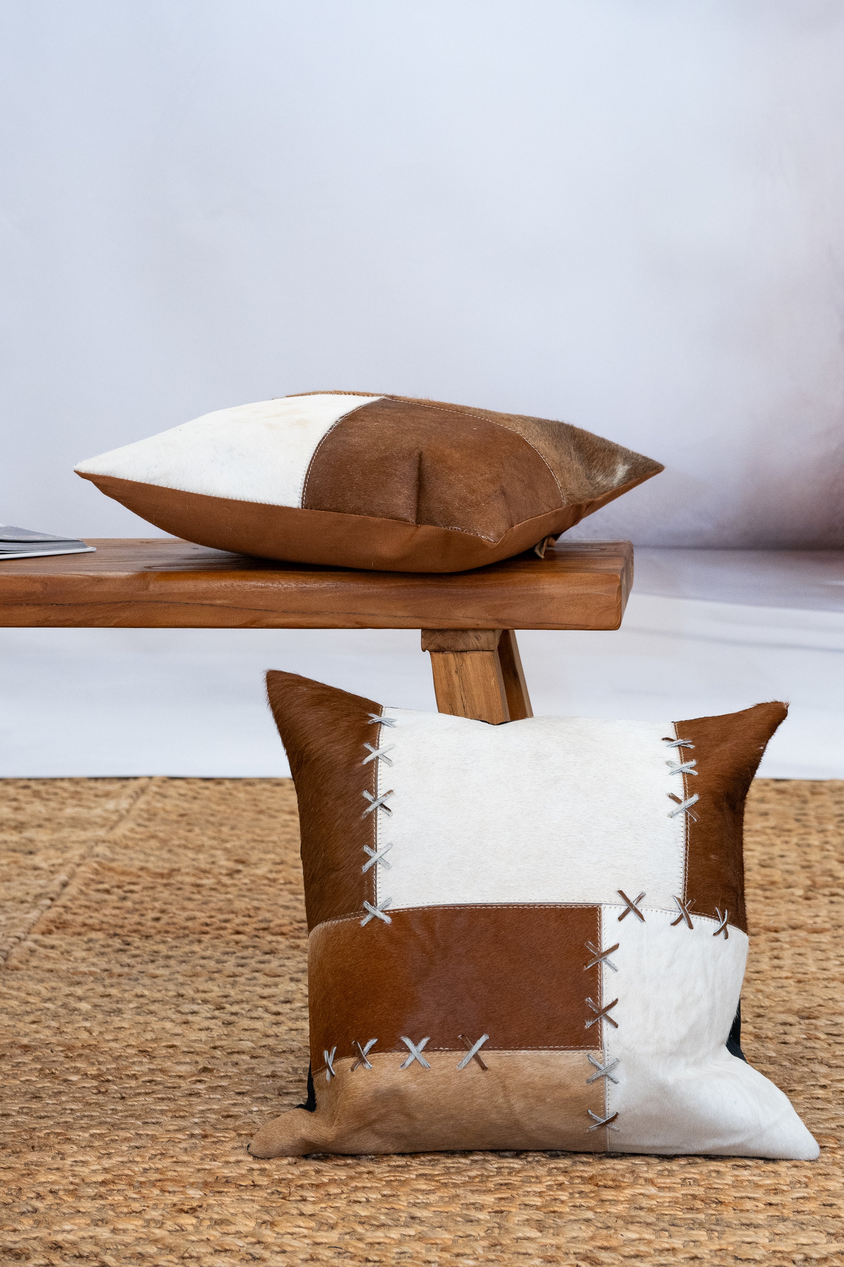 Handcrafted cowhide cushion with natural patchwork style