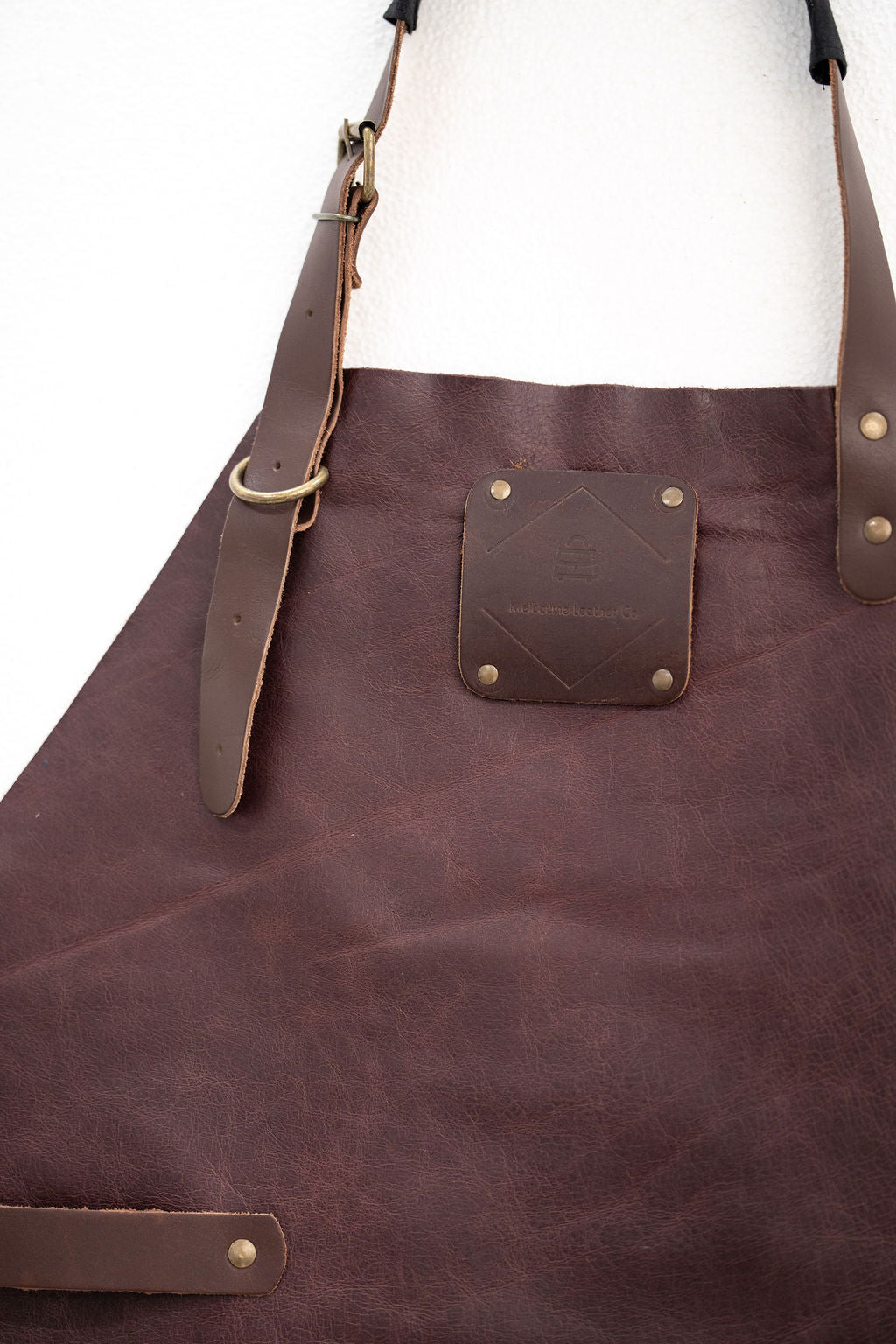 Handcrafted brown leather apron for woodworking and workshop use