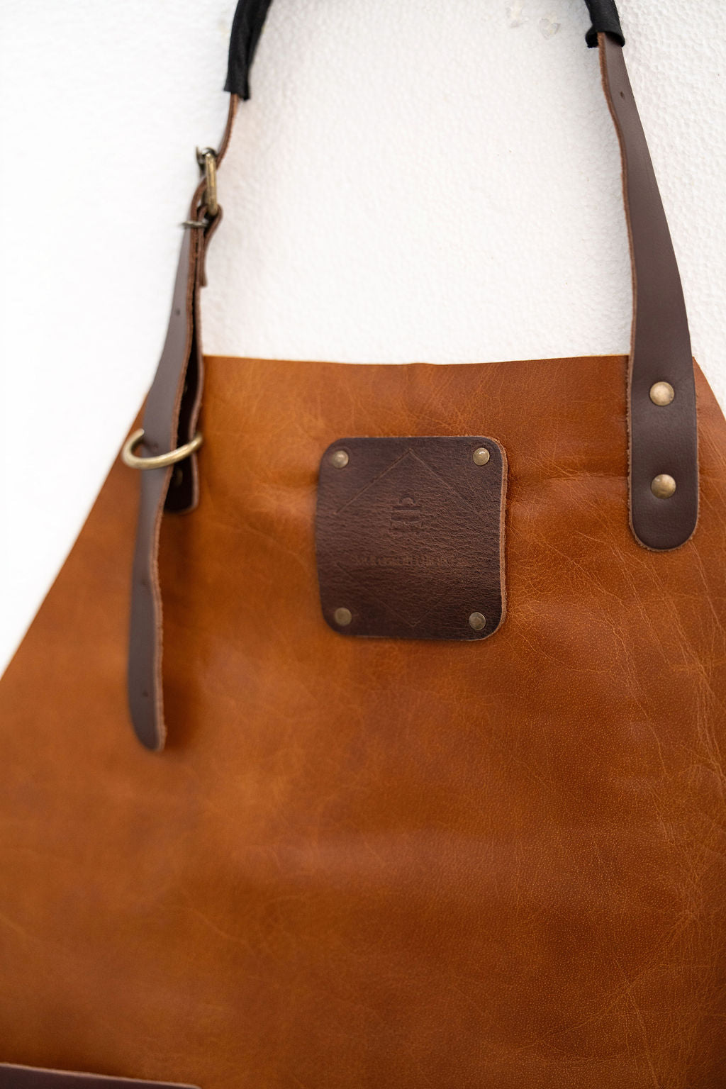Durable brown leather apron for professional craftsmen