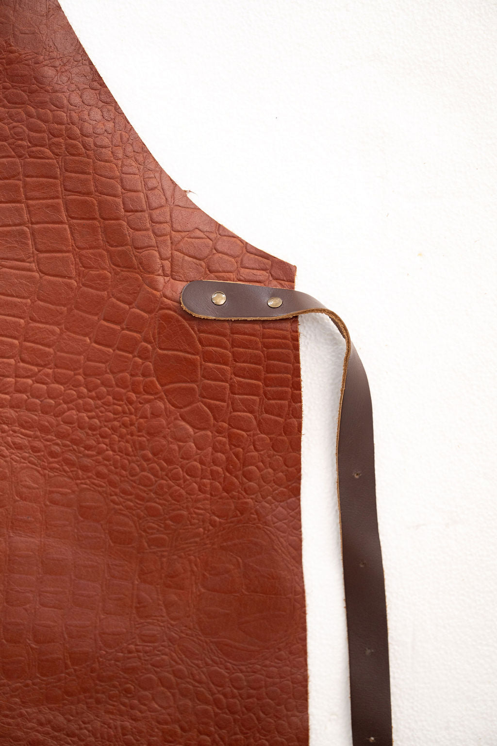 Close-up view of CraftLuxe croc embossed leather texture