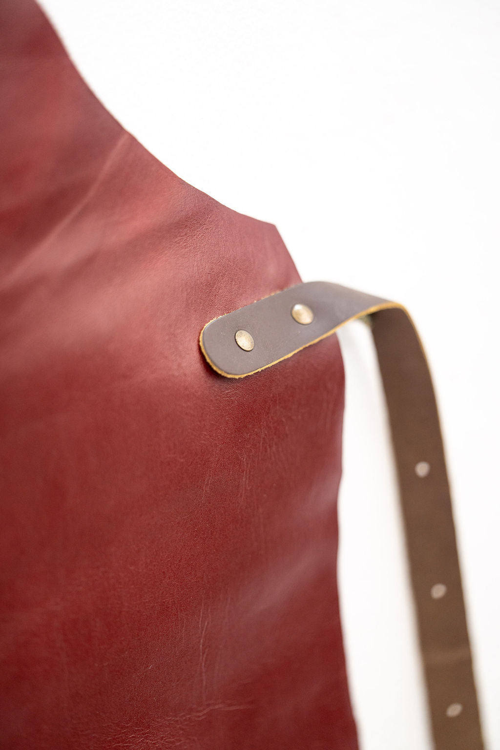 Premium red leather apron designed for makers