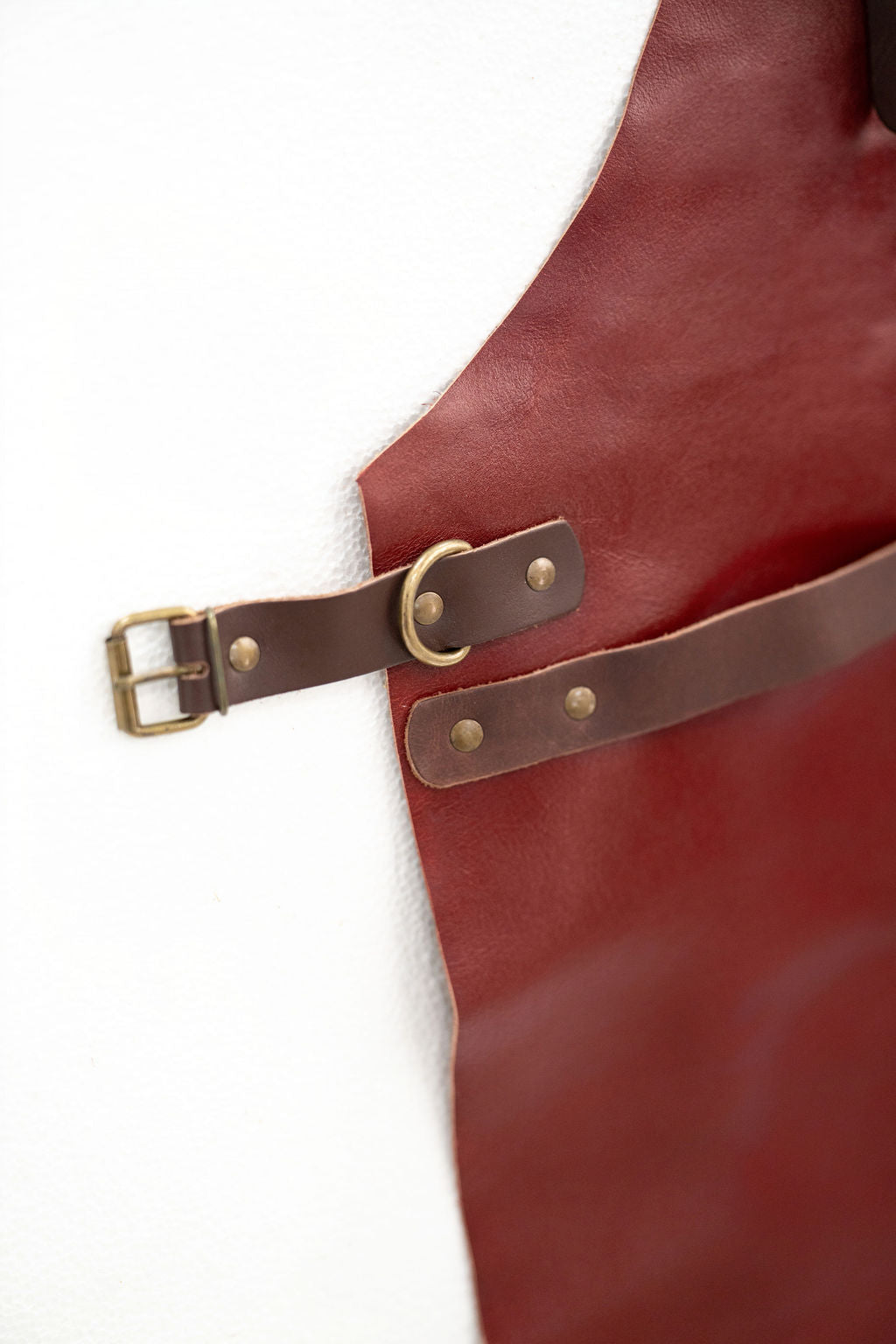 Red leather work apron for professional craftsmen