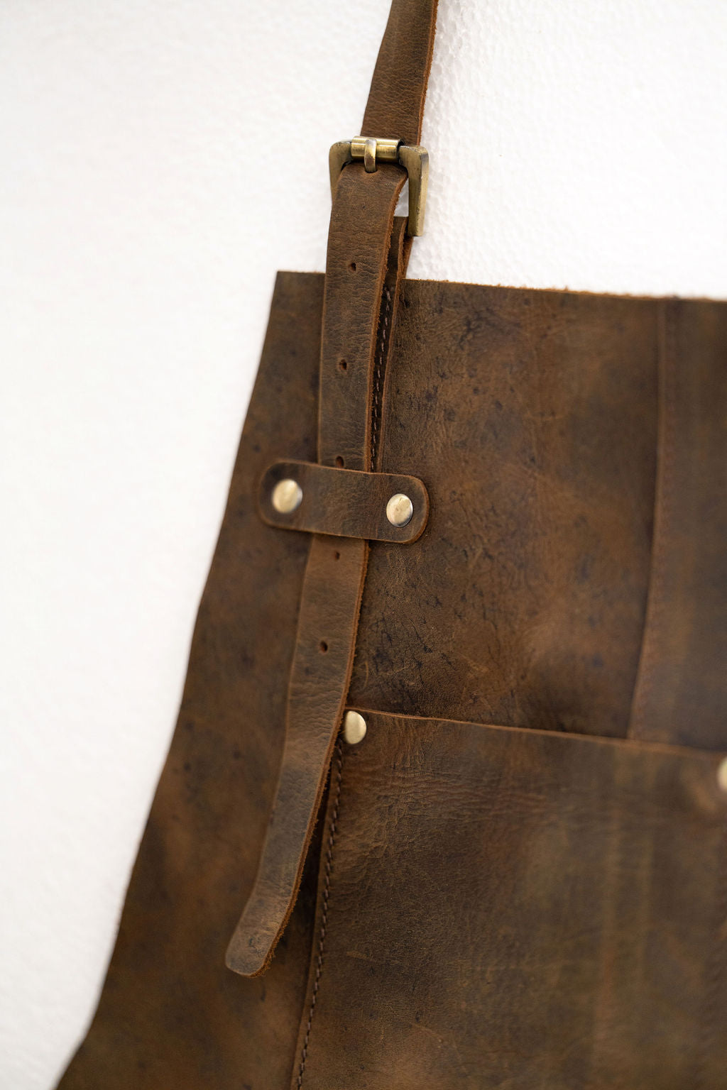 Durable brown leather apron for artisans and craftsmen