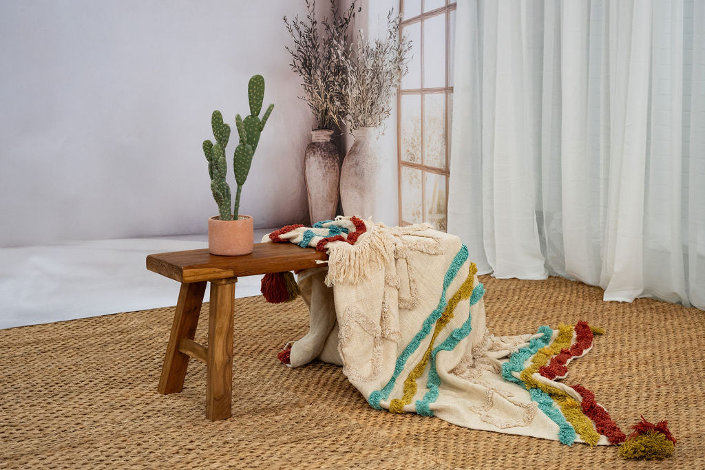 Decorative handwoven throw blanket with tassel details