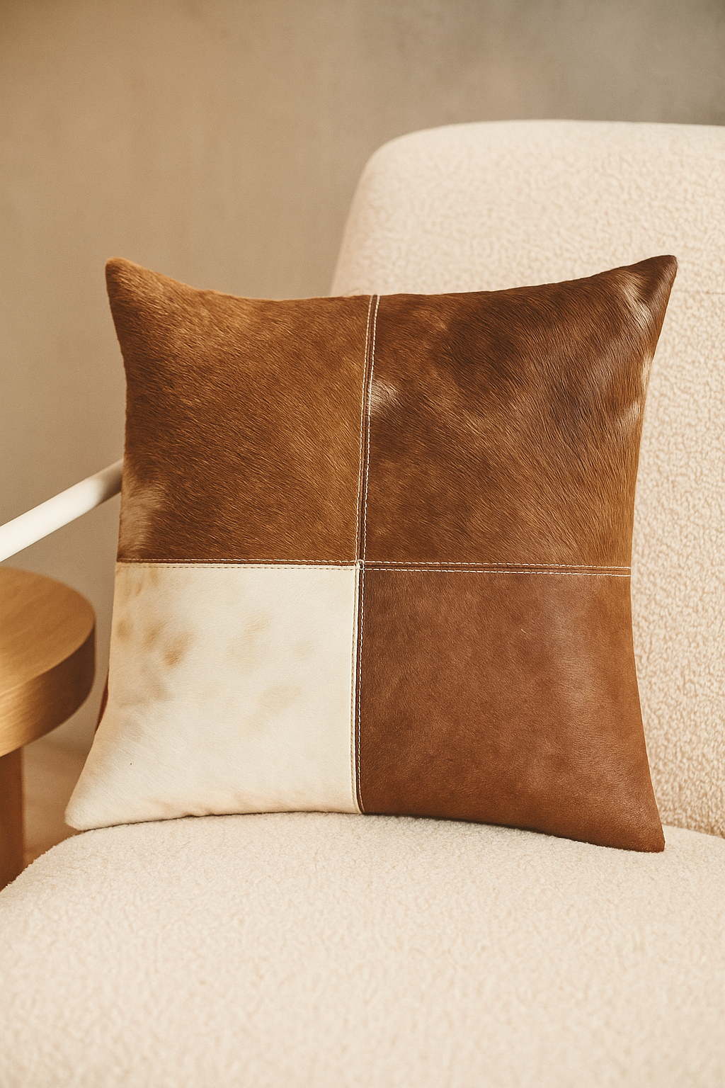 Natural cowhide cushion cover with rustic patchwork design