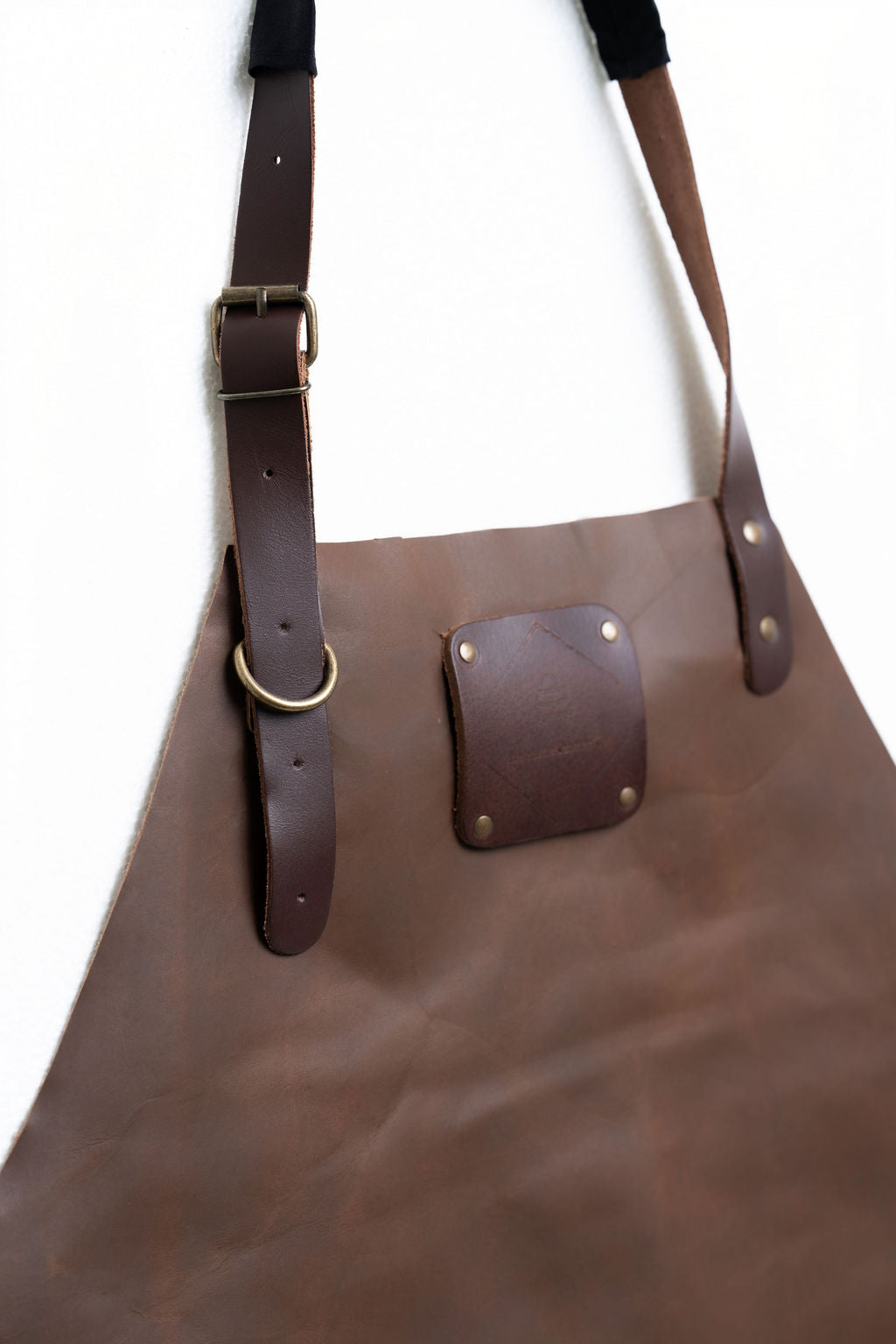 Brown full-length leather workshop apron for makers and craftsmen