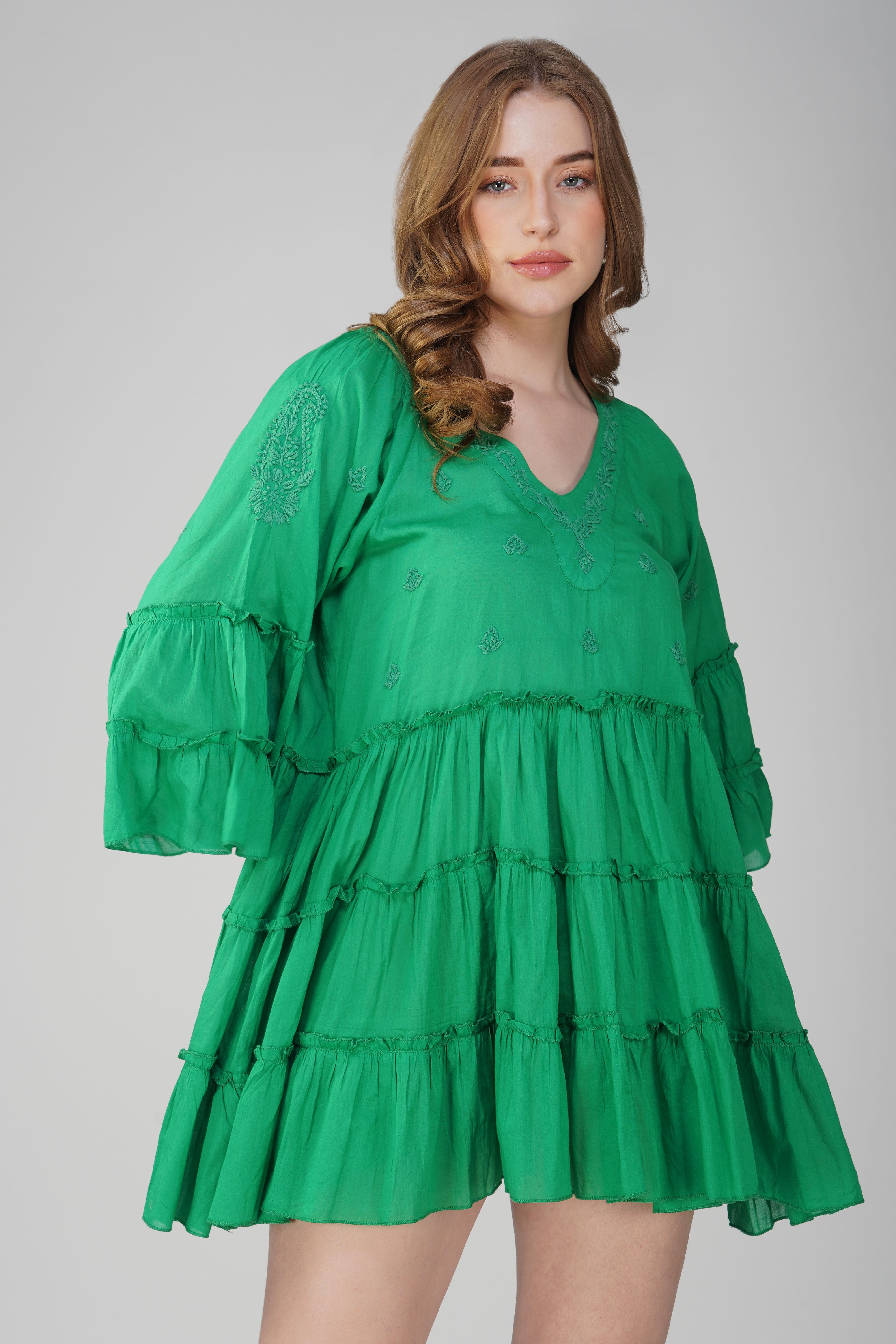 Women’s emerald green cotton mini dress with tiered silhouette