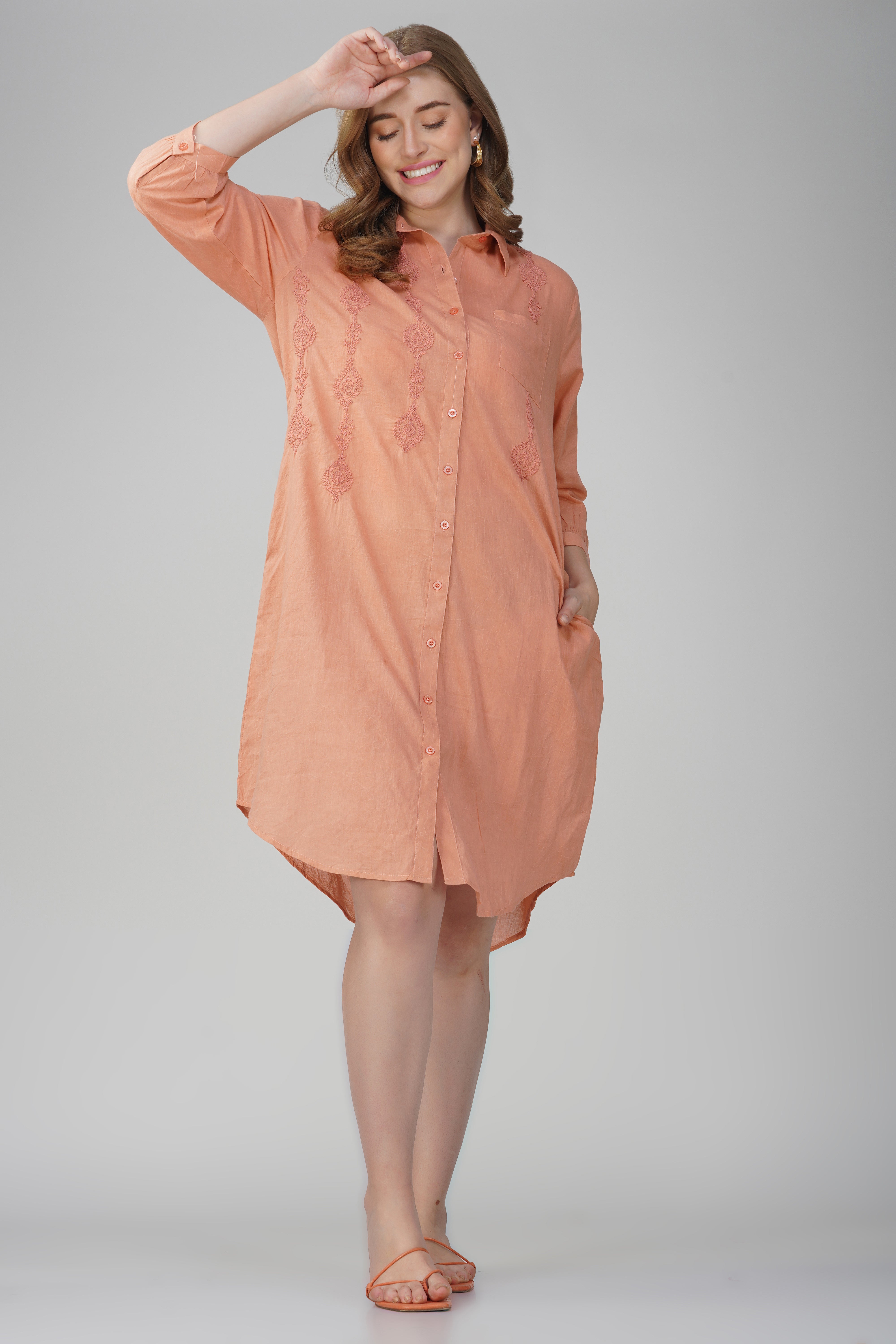 Lightweight embroidered cotton shirt dress in peach for summer styling