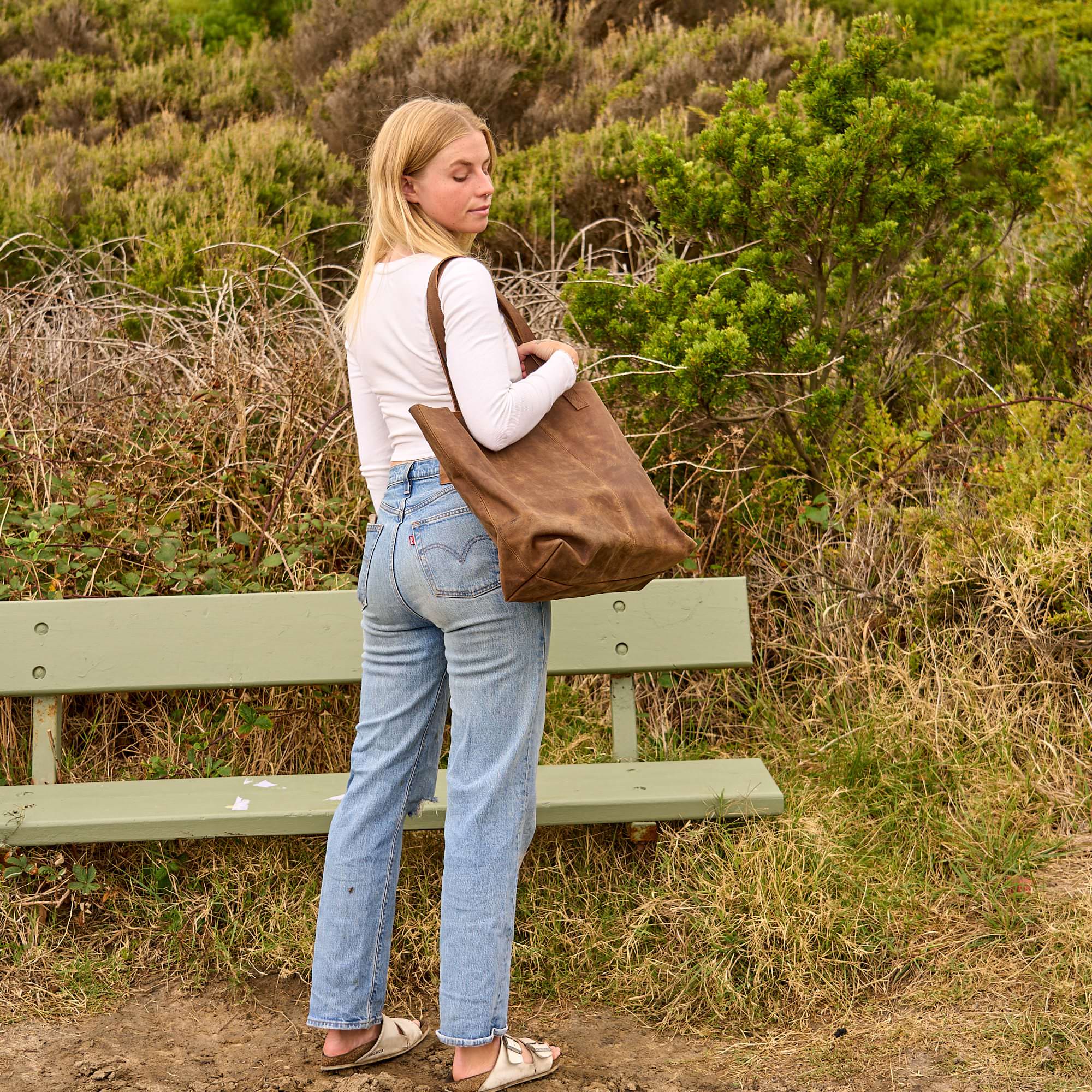 Classic brown leather tote bag with timeless design