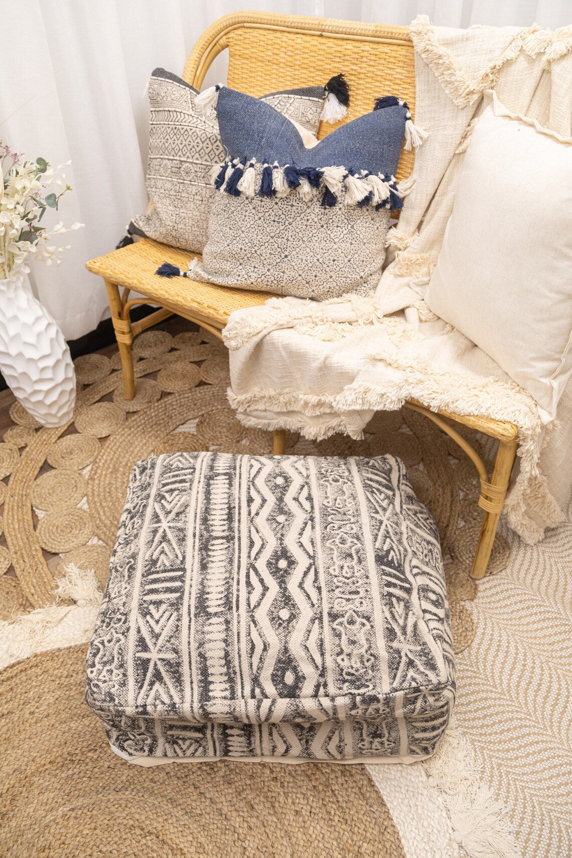Textured black and natural kilim ottoman cushion cover
